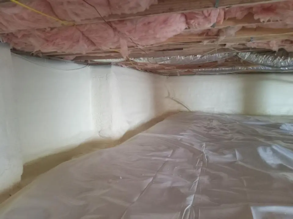 Crawl space encapsulation with closed-cell spray foam for Commercial Roof Restoration in Tucker